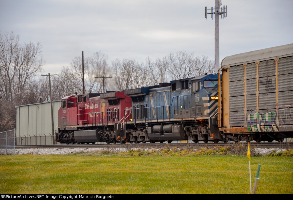 CP + CEFX AC44CW Locomotives leading a train